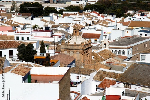 View over town rooftops and the Carmen church (Iglesia del Carmen), Estepa, Spain. © arenaphotouk