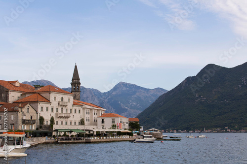 Coastal sea city on the background of mountains and sky. Perast. Montenegro. © Aliaksandr