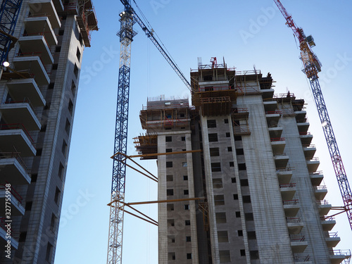 Modern construction site with scaffold platform sytem photo