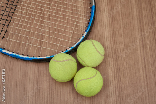 Still life of three tennis balls and a piece of racket © Albert