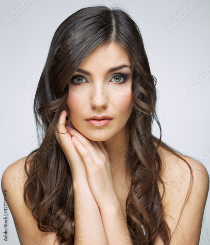 Face portrait of young model with long hair.