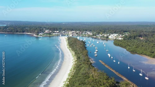 Wallpaper Mural Aerial drone view of Huskisson on the New South Wales South Coast, Australia, showing Currambene Creek and Jervis Bay on a bright sunny day    Torontodigital.ca