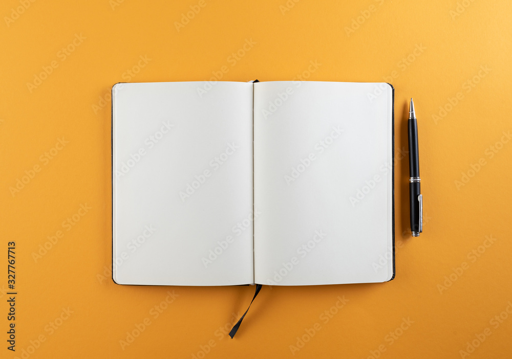 open diary or notebook with blank white pages on orange background template - obrazy, fototapety, plakaty 
