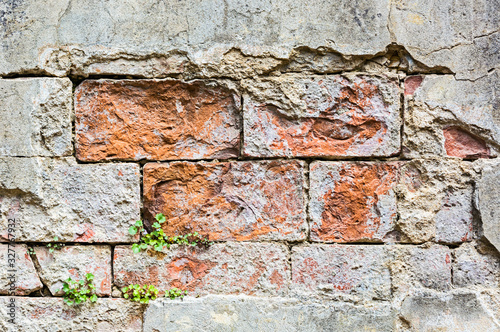 Red old worn brick wall texture background