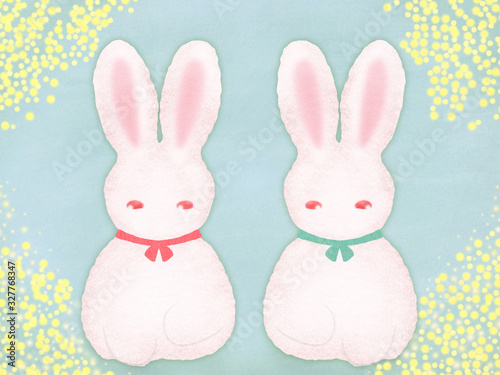 双子ウサギ-黄色×緑背景. © 桜 マチ