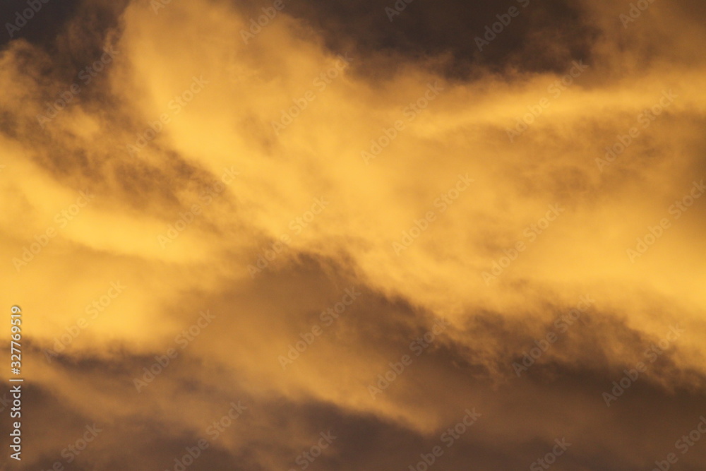 Vibrant vivid golden cloudy sunset