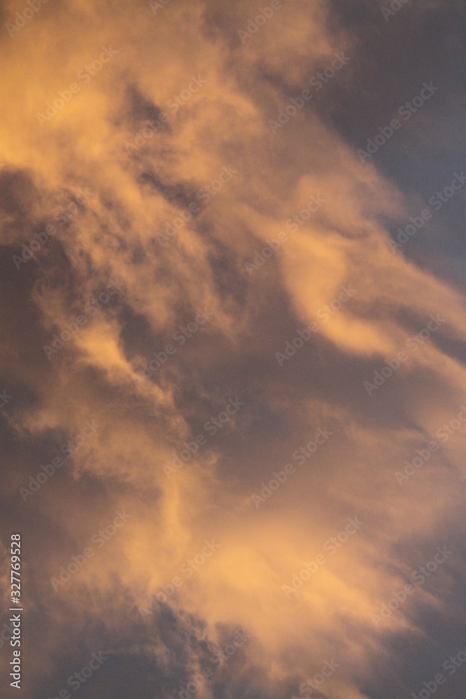 Vibrant vivid golden cloudy sunset