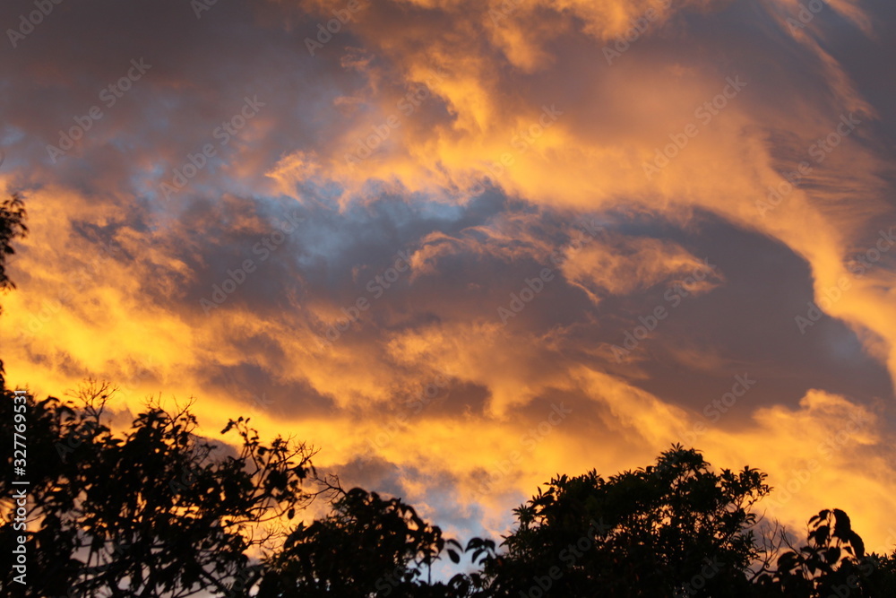 Vibrant vivid golden cloudy sunset