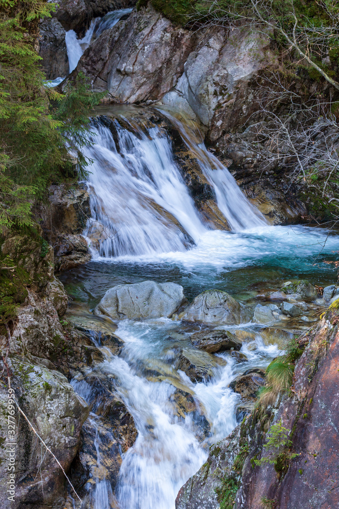 Fototapeta premium Waterfall on mountain stream, Wodogrzmoty Mickiewicza in Poland