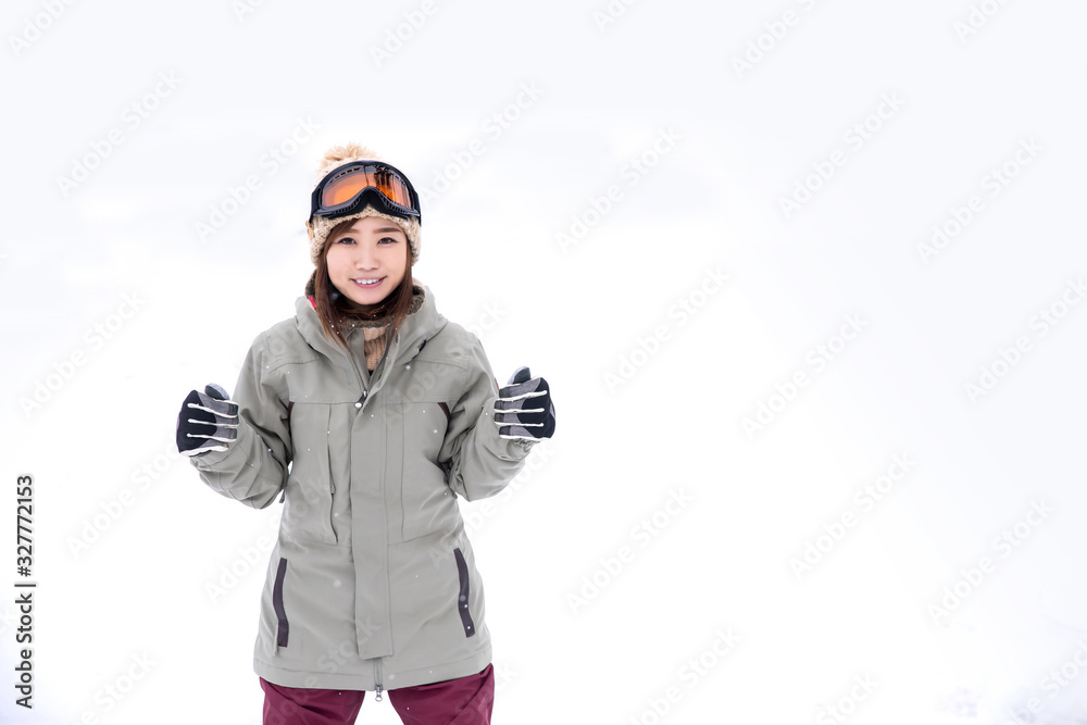 Fototapeta premium スノーボードをする女性