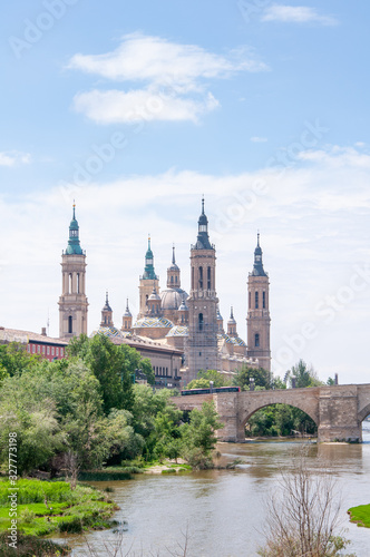Nuestra Senora del Pilar is dedicated to the Virgin Mary and named after her alleged appearance in these places around 40 CE.Stone Bridge on the Ebro River.