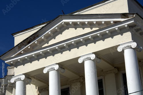 roof old building with large stone columns