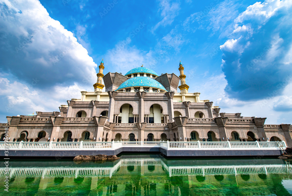 KUALA LUMPUR, MALAYSIA - Nov 12, 2019. Masjid Wilayah Persekutuan on blue sky background at daytime in Kuala Lumpur, Malaysia.
