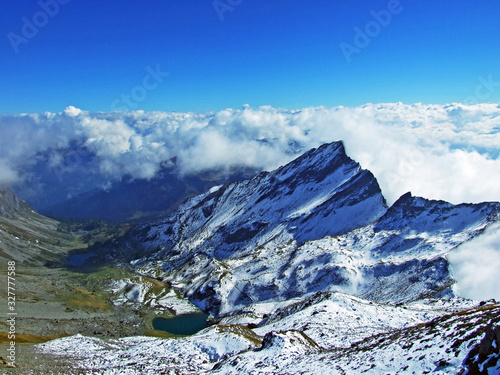 Early autumn and first snow on the Ratikon border mountain massif or Rätikon Grenzmassiv (oder Raetikon), Mainfeld - Canton of Grisons (Graubünden or Graubuenden), Switzerland photo