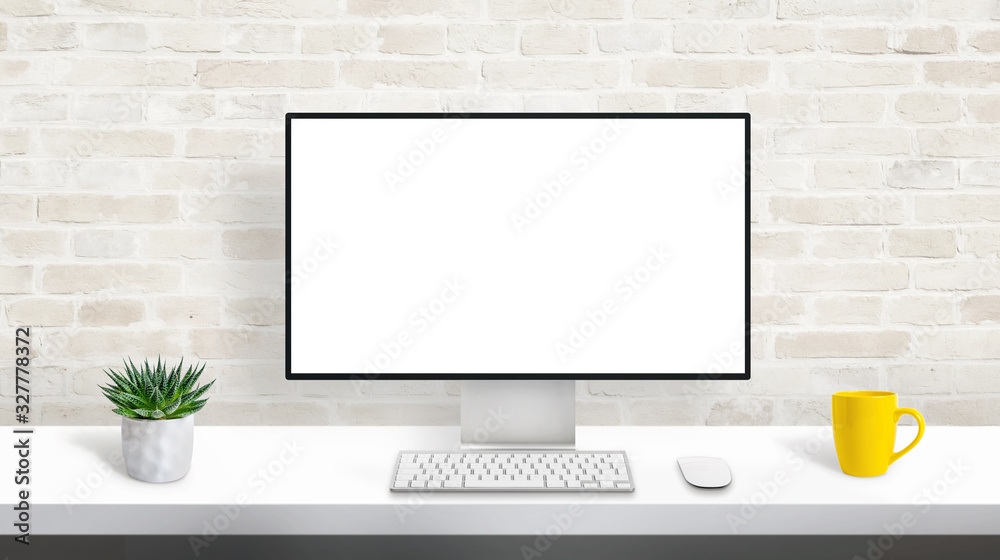 Fototapeta premium Computer display with isolated, blank, white screen for web site presentation mockup. Concept of designer studio