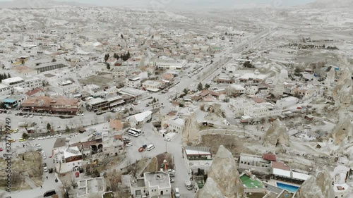 Aerial Drone Shot footage travelling and flying between fairy chimneys through valleys in Cappadocia Kapadoya Nevsehir Turkey photo