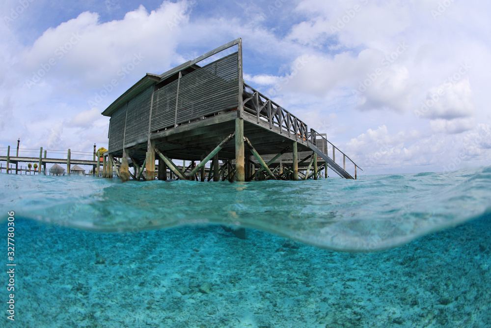 Fotografie Split image of water villas