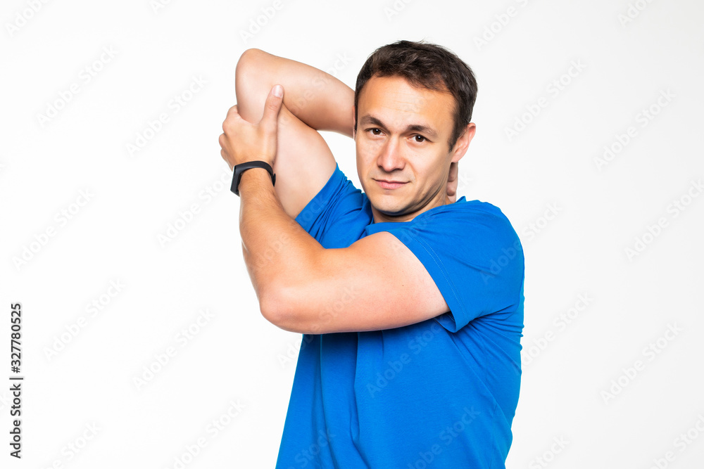 Full length portrait of young man athlete doing stretches exercises on white background Full length portrait of young man athlete doing stretches exercises on white background