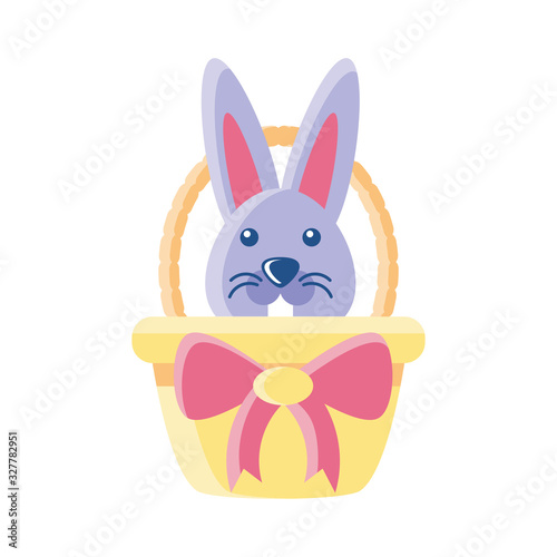 wicker basket with cute rabbit on white background