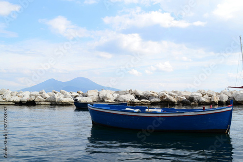 Wooden small old boat in porto Napoli Margelina seafront, italian travel destination. © Олександр Цимбалюк