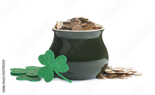 Pot of gold coins and clover on white background. St. Patrick's Day celebration photo