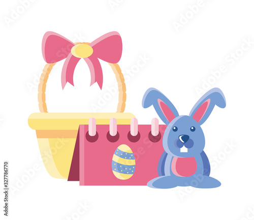 wicker basket with cute rabbit on white background