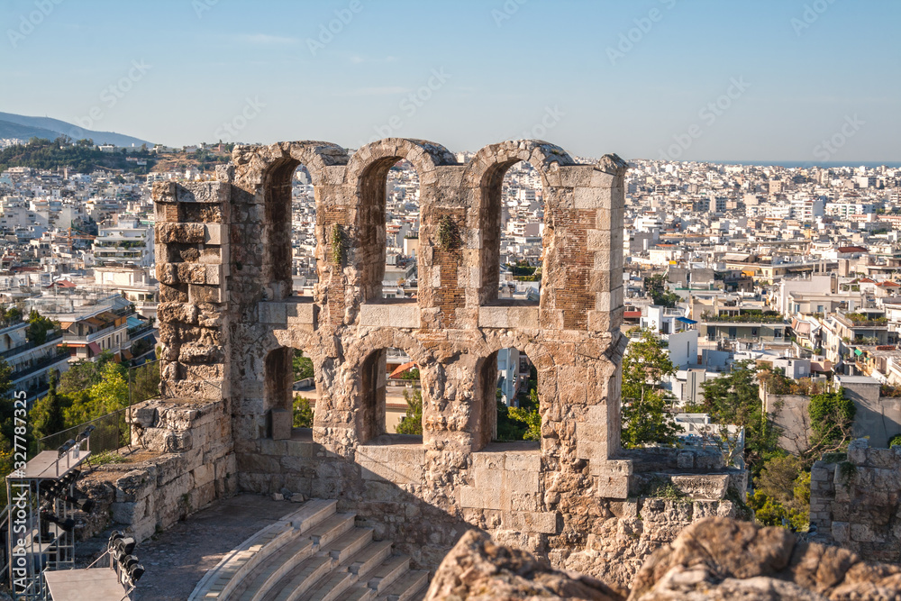 Ruins of wall on background of Athens