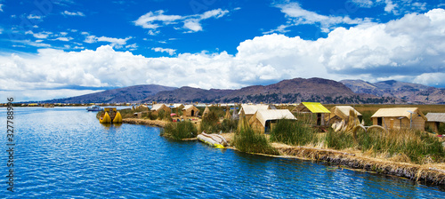Totora boat on the Titicaca lake near Puno, Peru photo