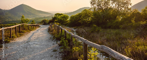 horizontal background path hill at sunset in the Euganean Hlls area Pianoro del Mottolone trail Padua Italy Veneto region photo