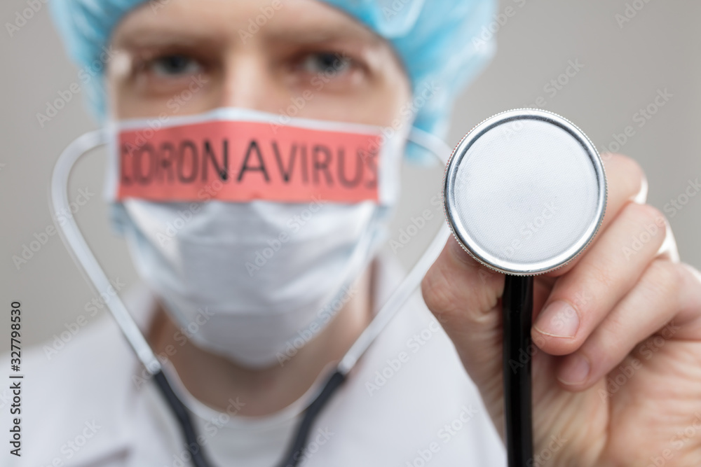 Doctor with a respiratory mask fighting the deadly Coronavirus Covid-19 epidemic Doctor with a respiratory mask fighting the deadly Coronavirus Covid-19 epidemic