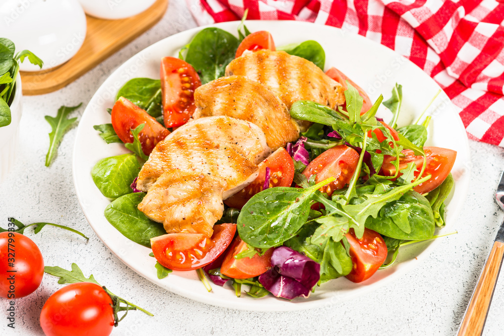 Salad with Grilled chicken, green leaves and vegetables. Salad with Grilled chicken, green leaves and vegetables.