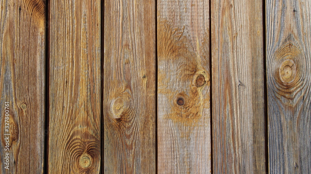 texture of old wood accentuated by sunlight