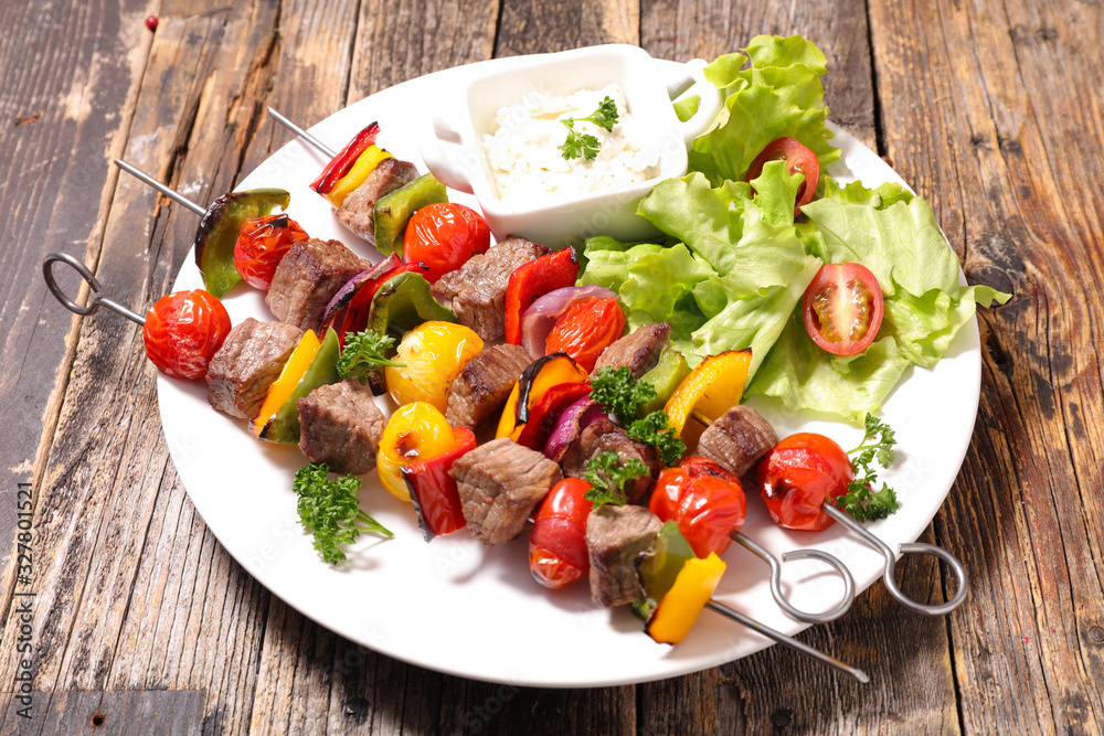 fried beef barbecue with tomato and bell pepper