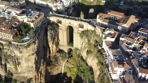 Puente Nuevo arch bridge at the village of Ronda Spain in the province of Málag Andalucia, Aerial pan left circling shot