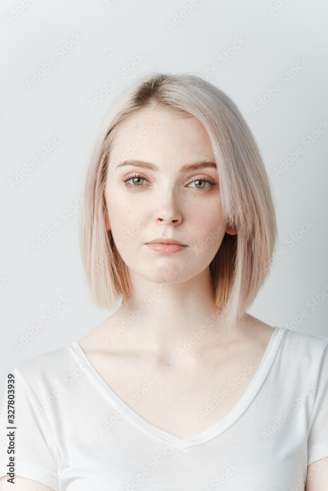 Indoor portrait of beautiful blonde young woman Indoor portrait of beautiful blonde young woman