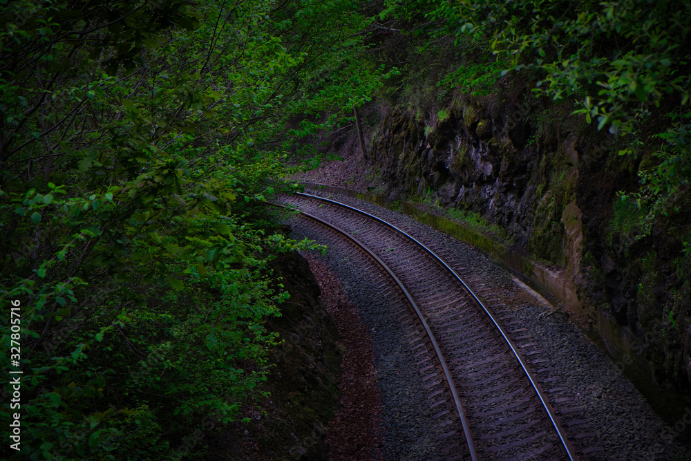 Train tracks direction to the high mountains. Train tracks direction to the high mountains.