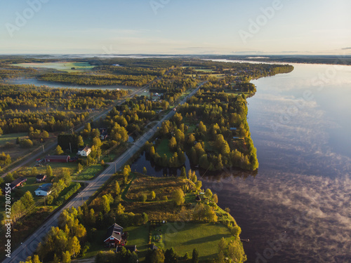 View of Kem River, Kemijoki, in a Liedakkala village in the municipality of Keminmaa in Lapland in north-western Finland, Aerial summer dawn sunrise photo