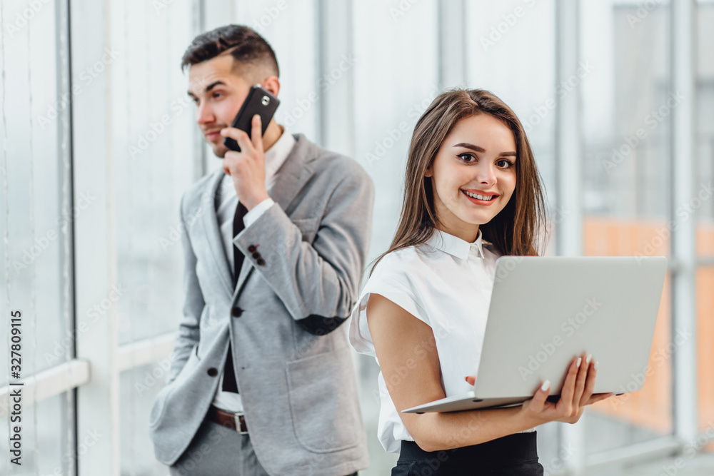 Business consulting concept. Inspired man and woman providing help to their clients. Business consulting concept. Inspired man and woman providing help to their clients.