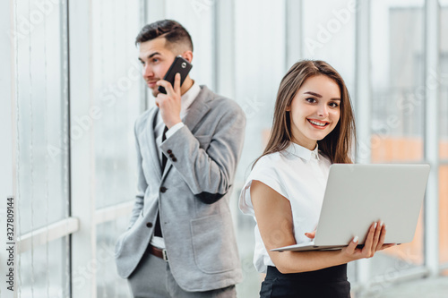 Business consulting concept. Inspired man and woman providing help to their clients.