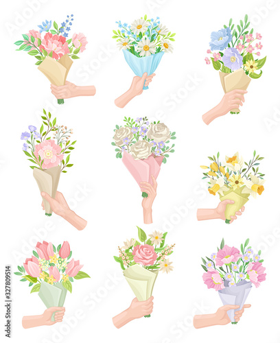 Hands Holding Flower Bouquets Wrapped in Craft Paper Vector Set