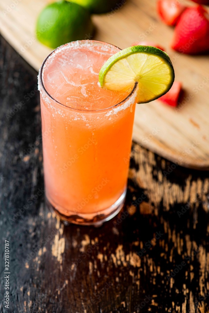 Frozen tropical cocktails. Traditional classic Hawaiian or tiki bar tropical drinks. Drinks w/ dark aged rum, blanco tequila, amaretto, garnished w/ limes pineapple cherries coconuts served frozen. Frozen tropical cocktails. Traditional classic Hawaiian or tiki bar tropical drinks. Drinks w/ dark aged rum, blanco tequila, amaretto, garnished w/ limes pineapple cherries coconuts served frozen.