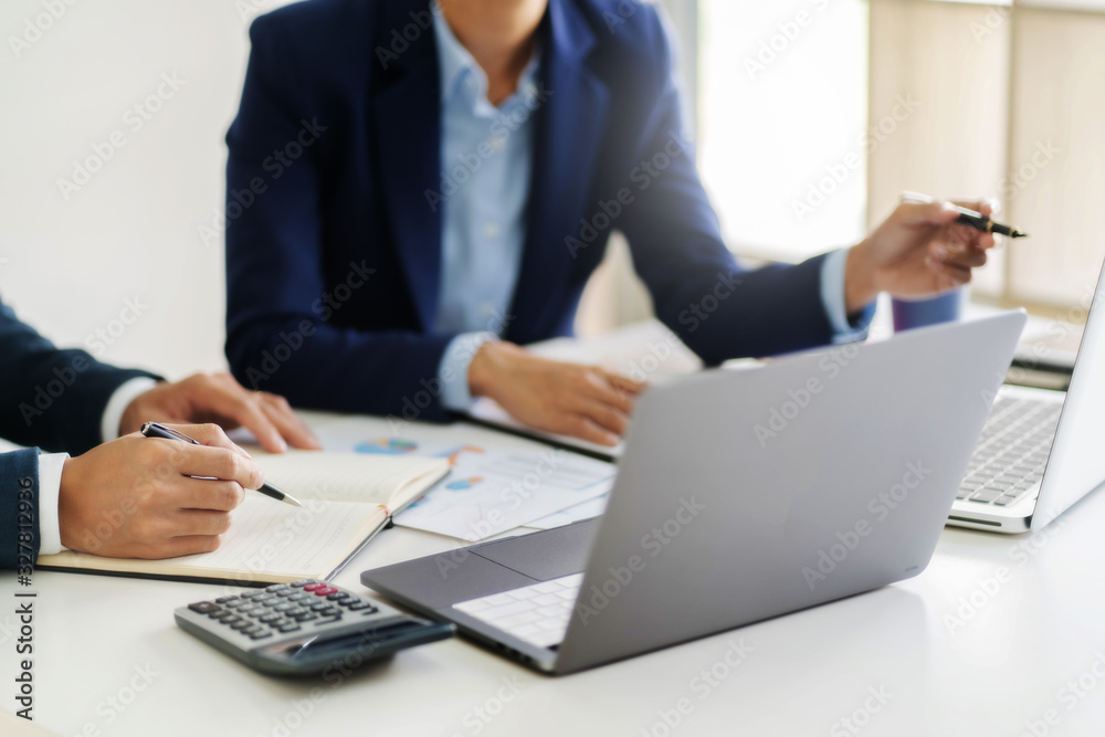 Business sales consultant discussing in data documents at modern office.. Business sales consultant discussing in data documents at modern office..