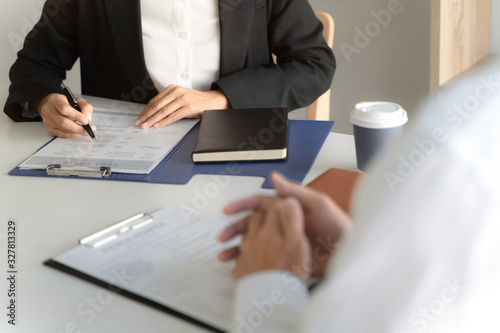 Candidate with resume at job interview with human resource  Recruitment concept..