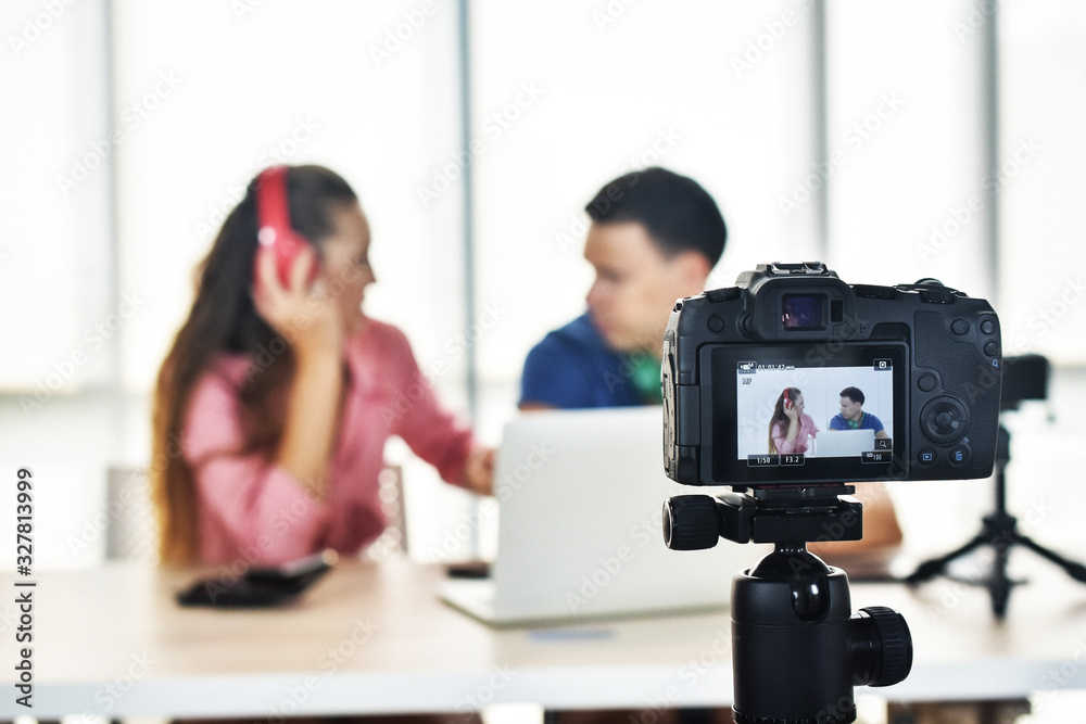 Young happy friends sharing content on streaming platform blogger Young happy friends sharing content on streaming platform blogger