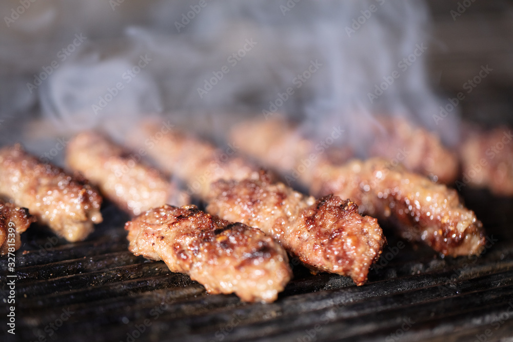 barbeque meatballs on grill. Balkan grill meatballs. Cooking meat barbecue on charcoal grill barbeque meatballs on grill. Balkan grill meatballs. Cooking meat barbecue on charcoal grill