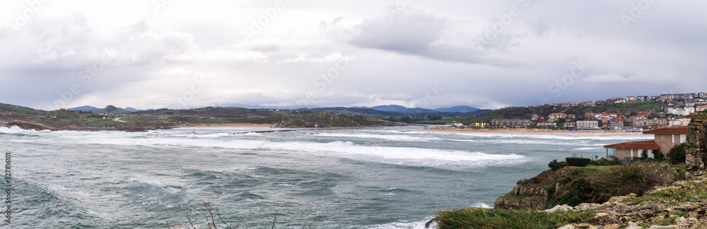 Panoramic photo of the bay of Suances in storm day with strong w Panoramic photo of the bay of Suances in storm day with strong w