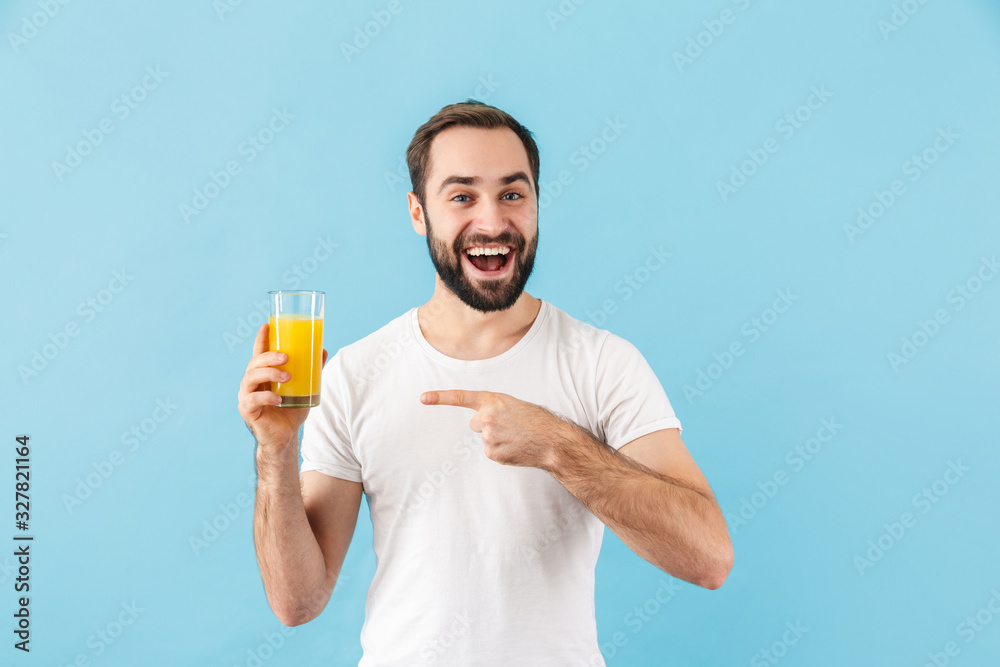 Handsome young bearded man wearing t-shirt standing Handsome young bearded man wearing t-shirt standing
