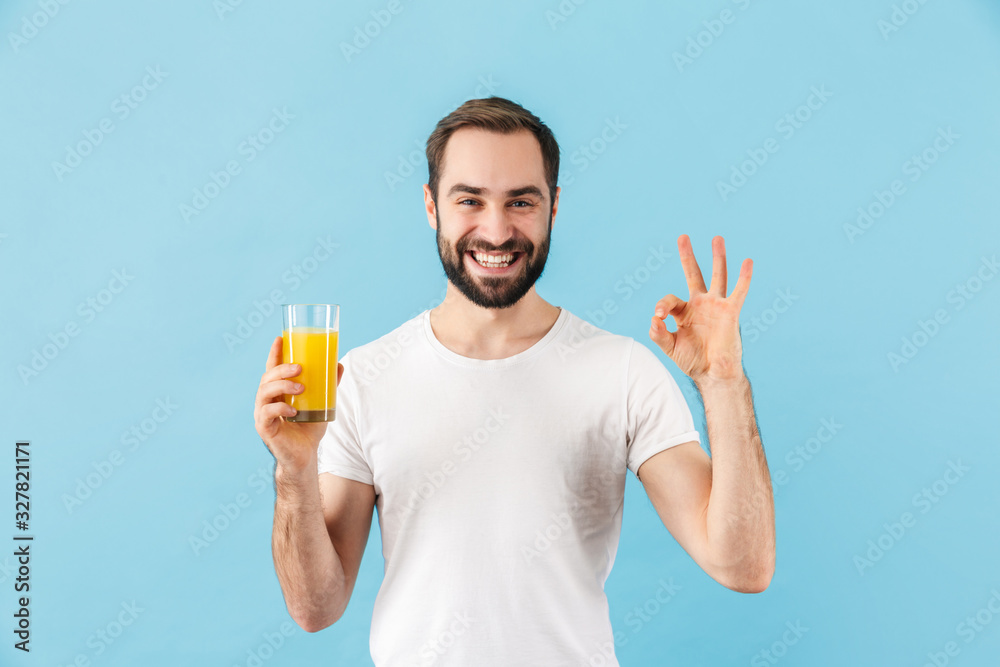 Handsome young bearded man wearing t-shirt standing Handsome young bearded man wearing t-shirt standing