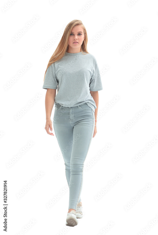 Fototapeta premium full length . modern young woman striding towards her goal