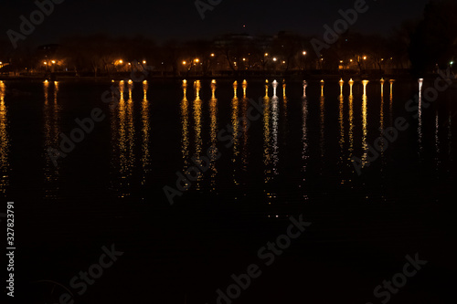 Youth park lake and beautiful lights efect in water photo